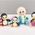Häkelanleitung Pinguinfamilie mit Deko