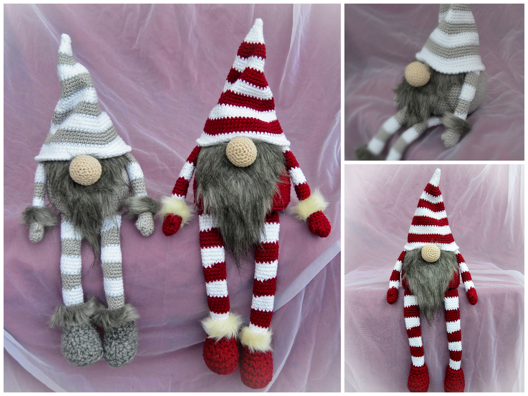 Zwei gehäkelte Wichtel, einer rot-weiß gestreift, der andere grau-weiß gestreift, mit langen Mützen, Bart und runden Nasen.