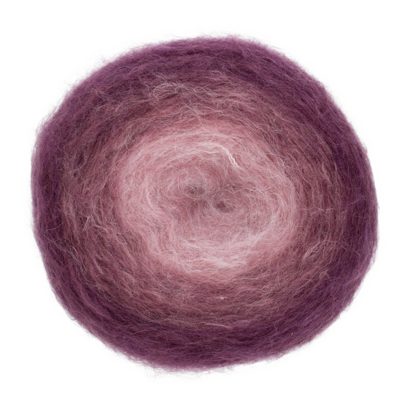 rundes Verlaufsgarn-Knäuel in Rosa und Violett mit flauschiger Struktur