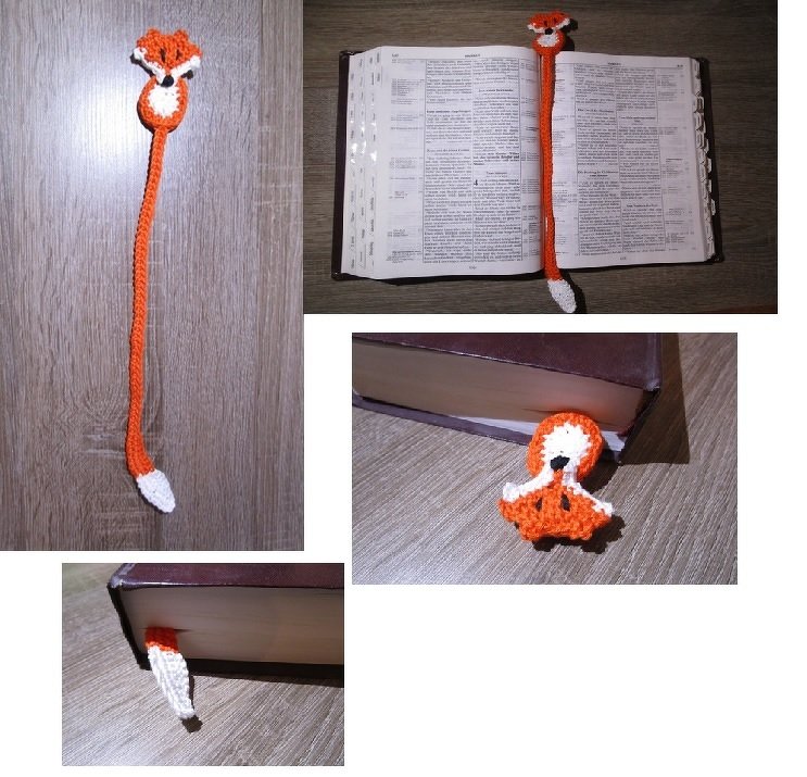 Gehäkeltes orange-weißes Fuchs-Lesezeichen, im Buch eingelegt