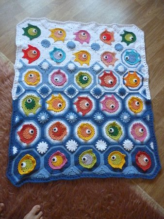 "Fish puzzle" baby blanket made of fish motifs