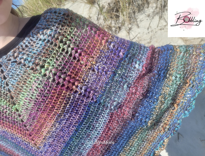 Poncho "Wollkatze" mit falschen Zöpfen