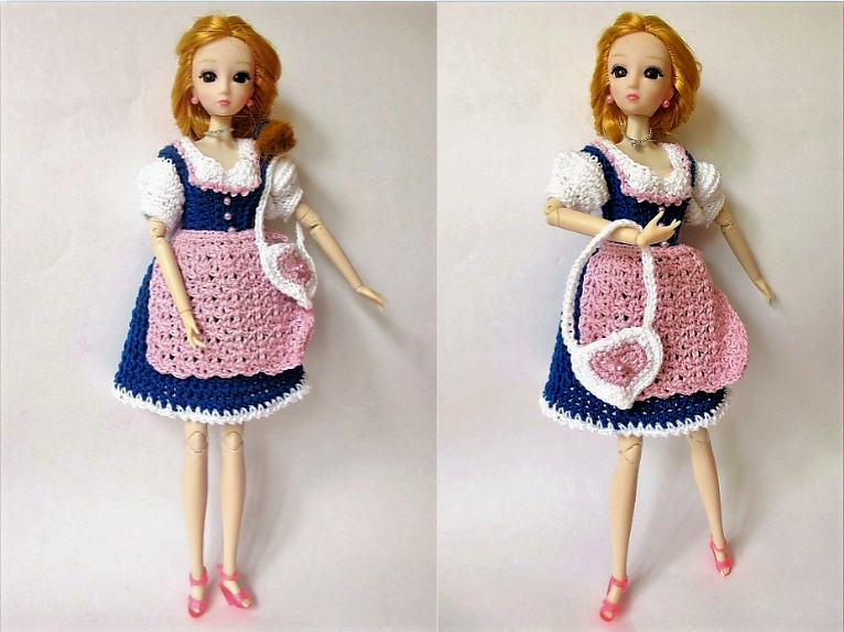 Puppe in gehäkeltem blau-rosa Dirndl mit Schürze und Tasche