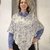 Eleganter Damen-Poncho mit Wellen