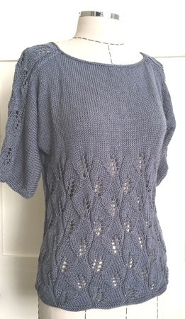 https://www.crazypatterns.net/uploads/cache/items/2018/06/40549/shades-of-grey-summer-top-knitted-with-lace-eyelet-pattern-on-body-and-3-4-sleeves-261x450.jpg
