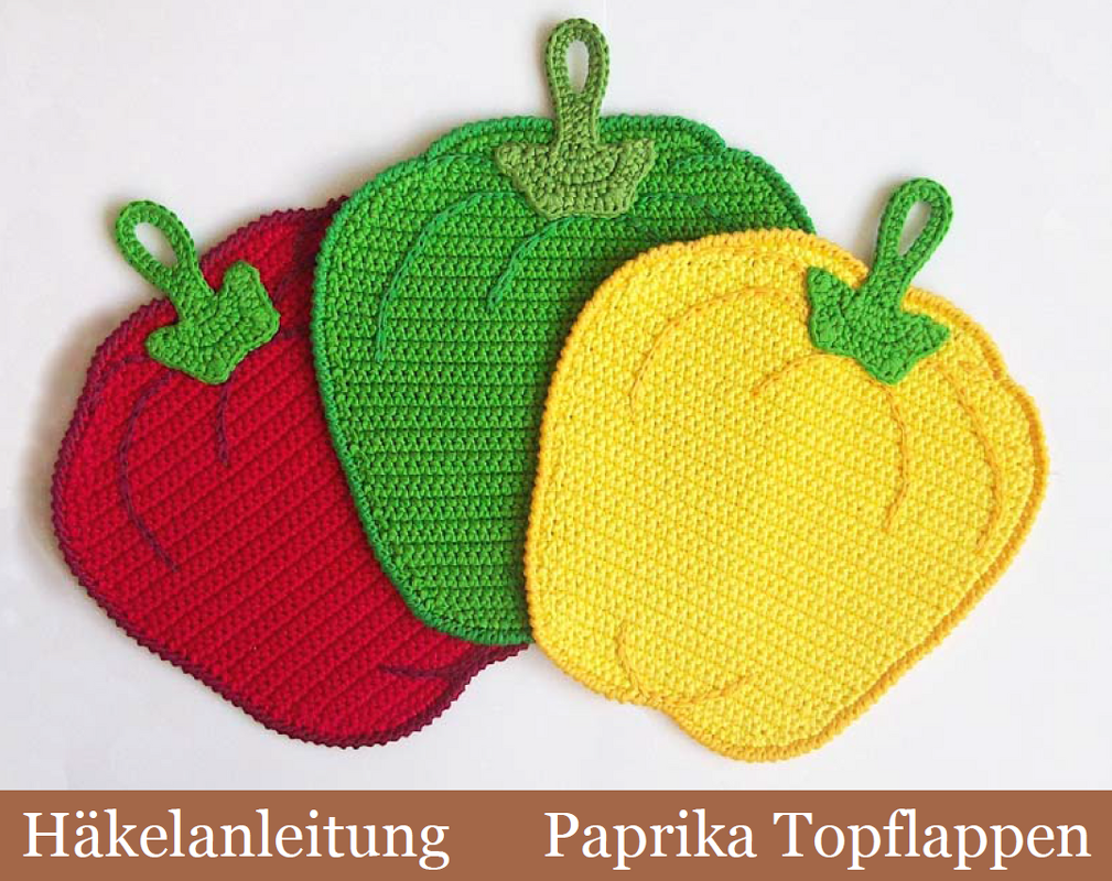Gehäkelte Paprika-Topflappen in Rot, Grün und Gelb mit Aufhängeschlaufen