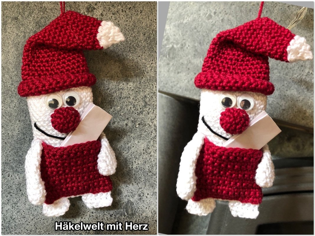 Gehäkelte weiße Figur mit roter Zipfelmütze, roter Nase, Wackelaugen und roter Schürze