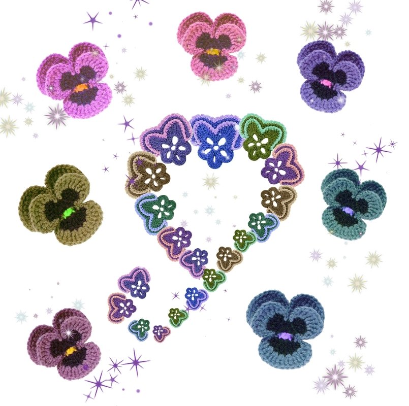 Mehrere bunte gehäkelte Stiefmütterchen-Applikationen, teilweise zu einer Herzform zusammengesetzt, vor hellem, leicht glitzerndem Hintergrund.