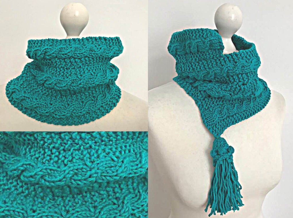 Türkiser gestrickter Loop-Schal mit Zopfmuster und Quaste auf Mannequin.