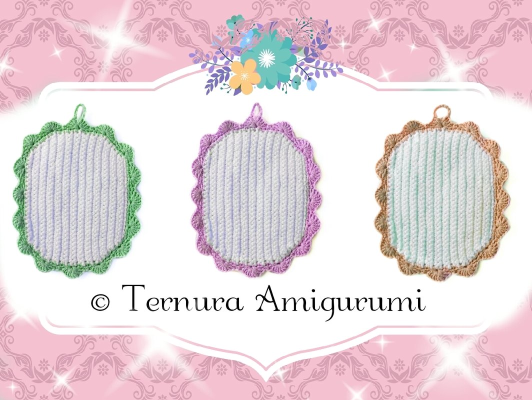 Three oval crocheted potholders with light-colored ribbed centers and scalloped green, purple, and tan borders, each with a hanging loop