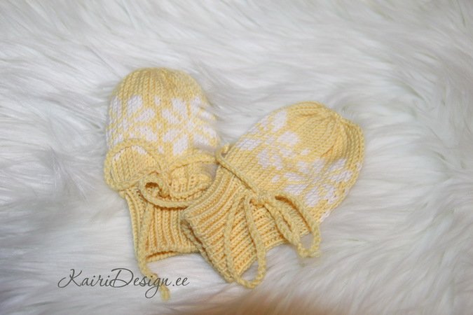Machine knitted baby mittens