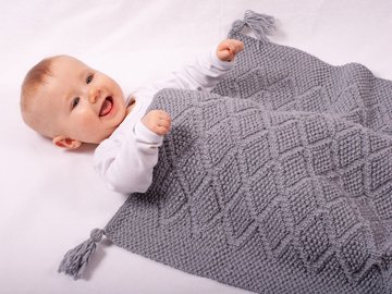 Strickanleitung Babydecke Sternenglanz in der Größe 54x74 cm