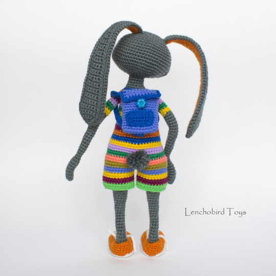 Amigurumi pattern for the Easter bunny. Colorful crochet sporty rabbit