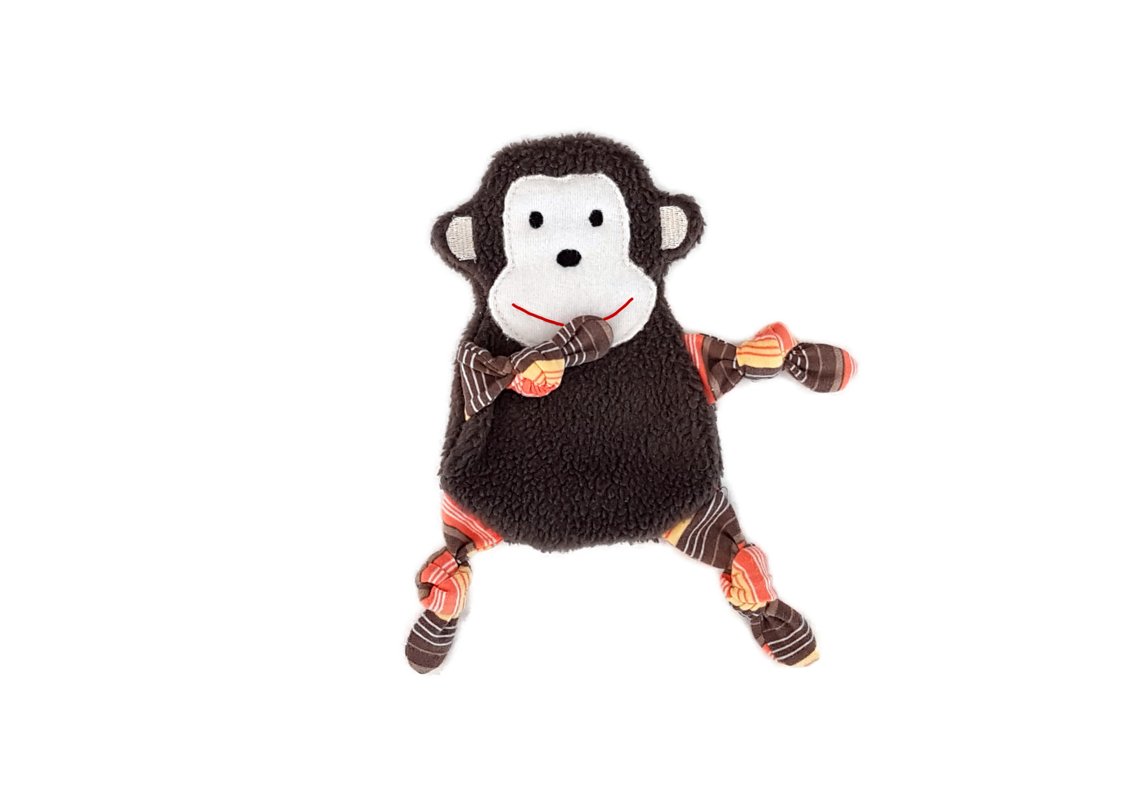 Flauschiges Affen-Schmusetuch mit weißer Gesichtspartie und geknoteten bunten Armen und Beinen