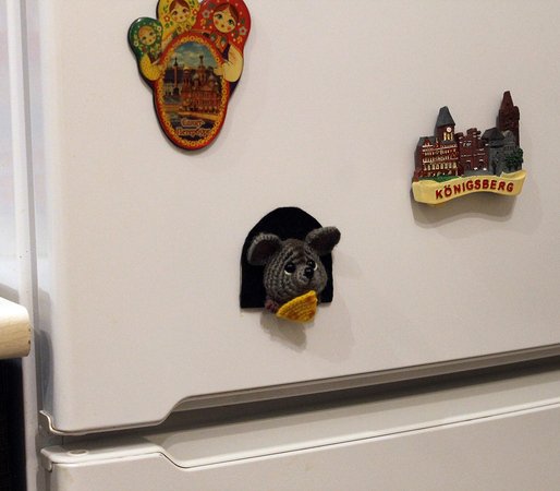 The mouse thief. A magnet on the fridge.