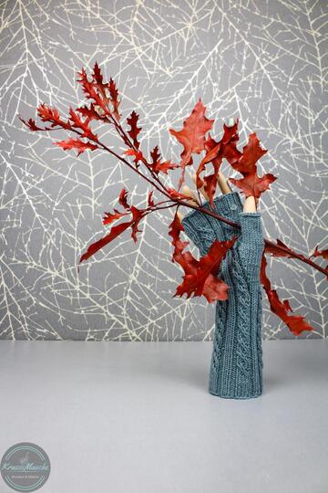 Twisted Left Stulpe Strickanleitung