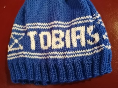 Strickanleitung für Kindermütze mit Namenzug im Norwegermuster