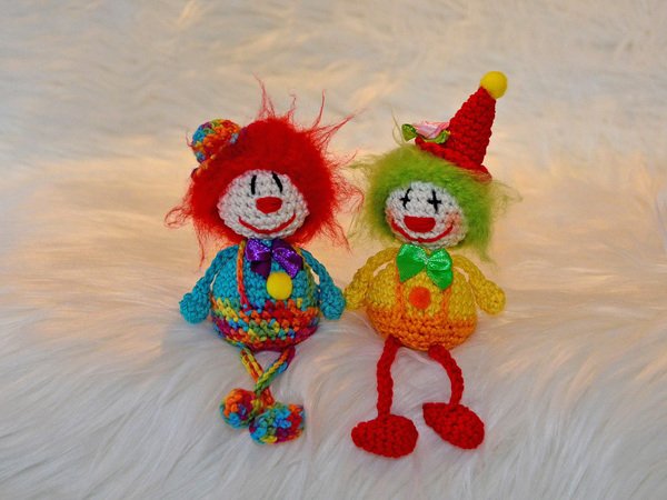 little sitting Clown several variants carneval funny present harlequin