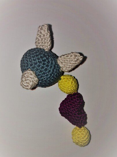 Kinderwagen-/ Rasselkette Baby mit Wölfchen/Hündchen