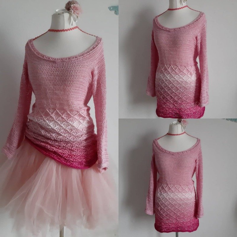 Rosa gehäkelter Damenpullover mit breitem Rundhals und diamantförmiger Struktur am Saum an Schaufensterpuppe