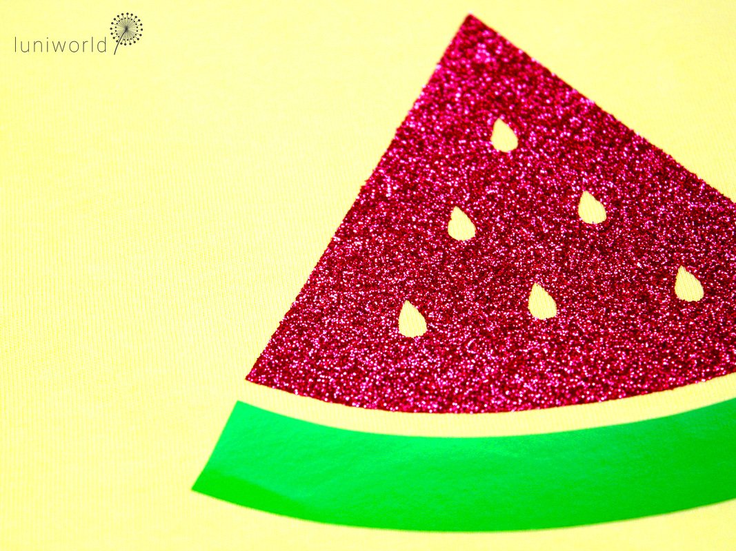 Minimal watermelon wedge template with glitter interior, seed cutouts, and green rind