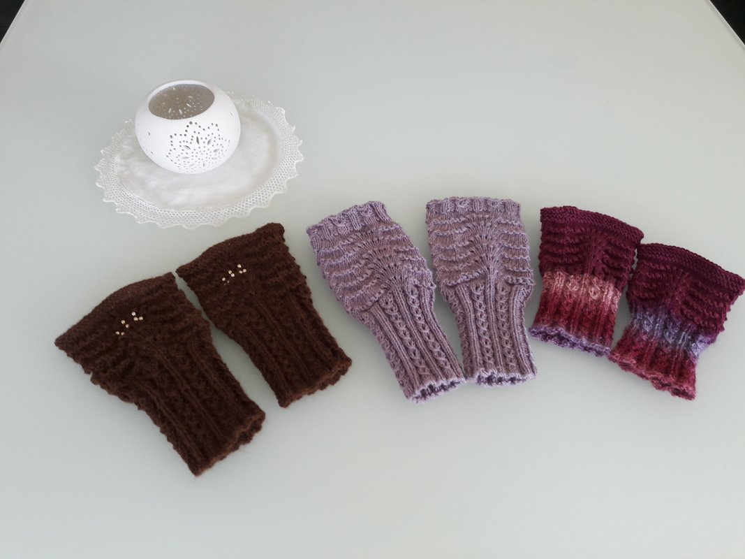 Warming Feathers - Anleitung Handstulpen