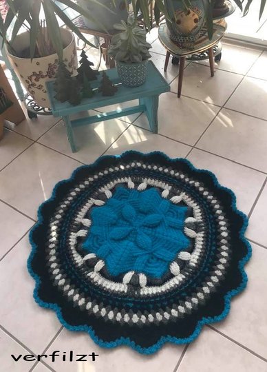 Runder Teppich Reliefstern