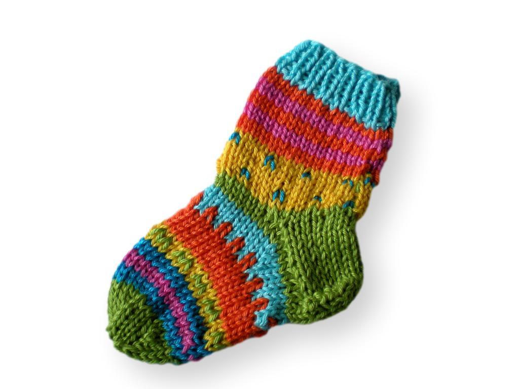 single colorful striped knitted baby sock with ribbed cuff on white background