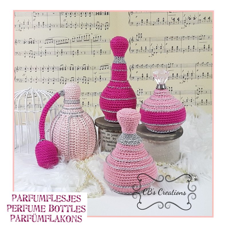 Four pink crocheted perfume bottle-shaped decorations in varying shapes and sizes on white faux fur with sheet music background