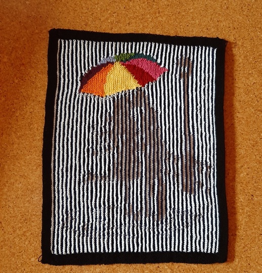 Schattenstrickbild mit buntem Regenschirm 2 Nur für Farbwechsel-Geübte.