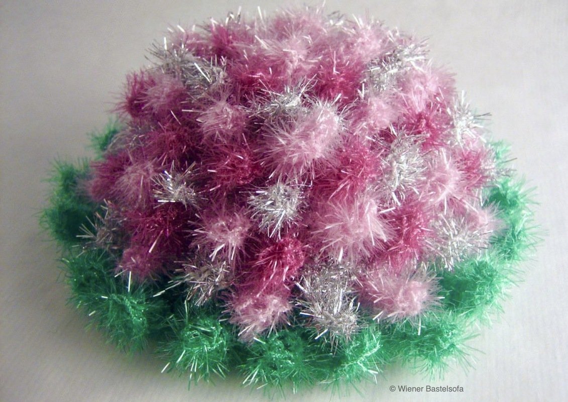 Badeschwamm „Resteblume“ zur Verwertung von Resten von Spülschwammgarn