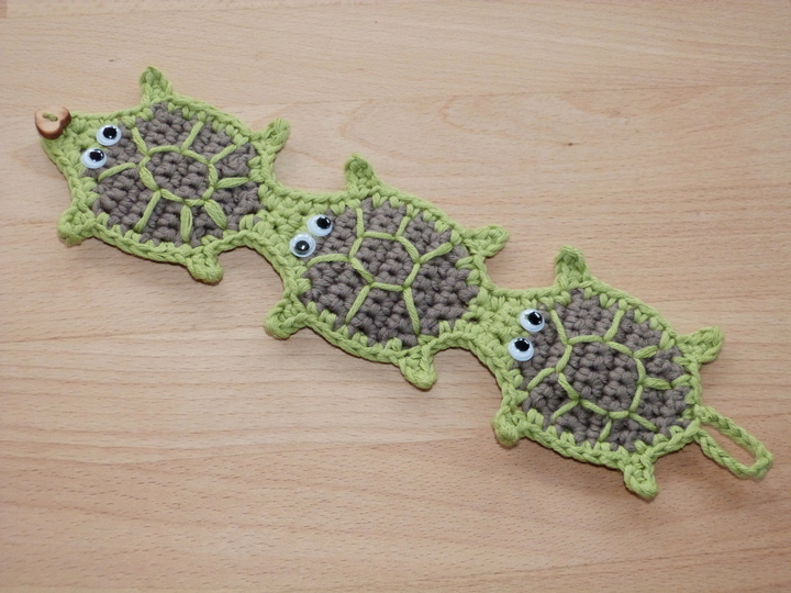 Häkelanleitung für Tassenwärmer "Cup cozy" mit 4 tierischen Motiven