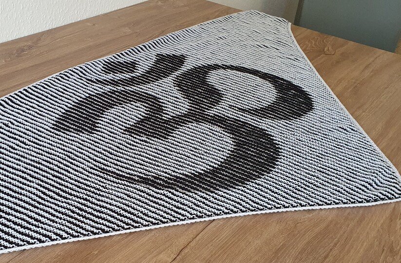 OM-Symbol, Schattenstricken, Illusionsstricken, Motivtuch