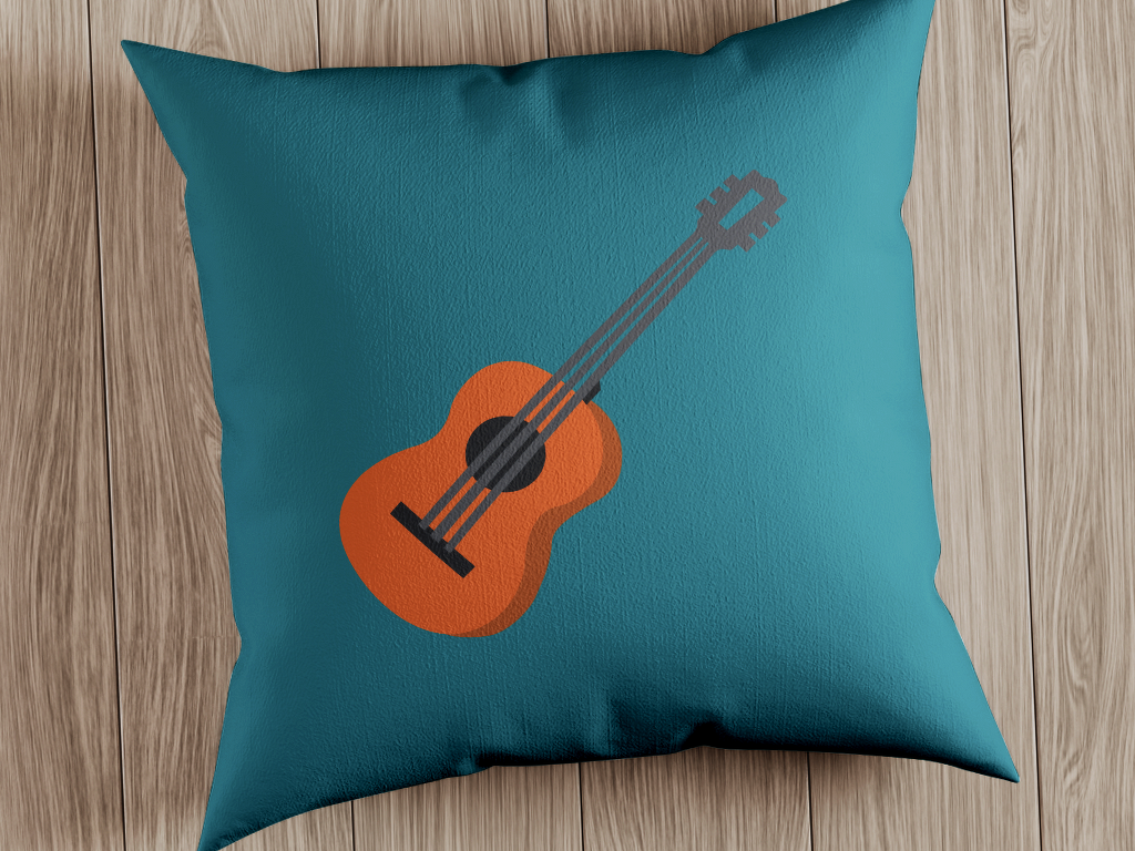 Nahaufnahme eines türkisen Kissens mit orangefarbener Gitarrengrafik