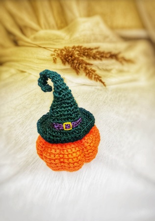 Crochet pattern pumpkin in a witch's hat