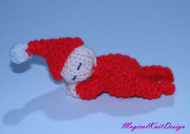 Baby sleeping in a Christmas decoration ball knitting pattern
