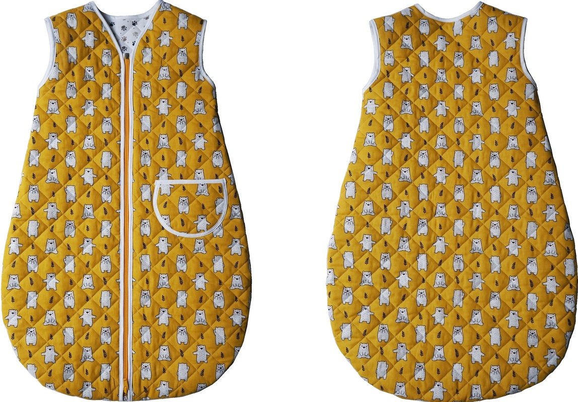 Front and back views of a quilted mustard-yellow sleeveless baby sleeping bag with white bear print, center zipper and piped front pocket