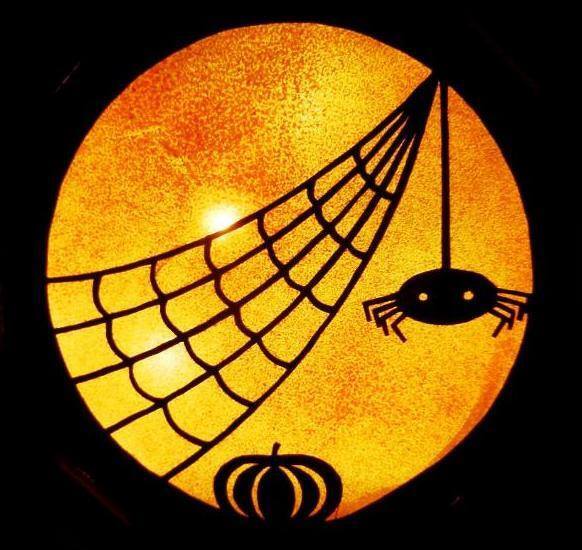 Runde einfarbige Silhouette mit Spinnennetz, hängender Spinne und Kürbis