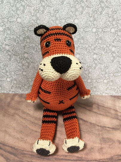 Häkelanleitung für die Spieluhr Leonardo der taktvolle Tiger