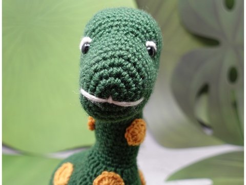 Dino Yelly in Grün mit gelben Punkten