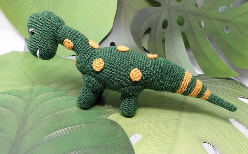 Dino Yelly in Grün mit gelben Punkten