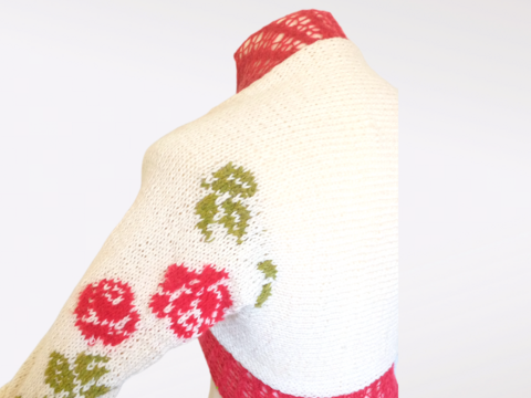 Strickanleitung für einen verspielten Schulterwärmer mit Rosenmuster