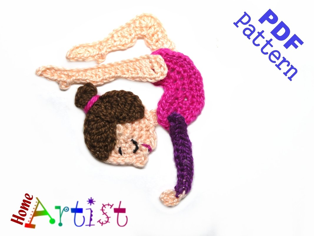 Hand-crocheted gymnast applique with brown bun, pink leotard, and purple leg extension on white background