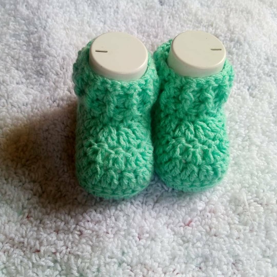 Crochet baby booties worked flat