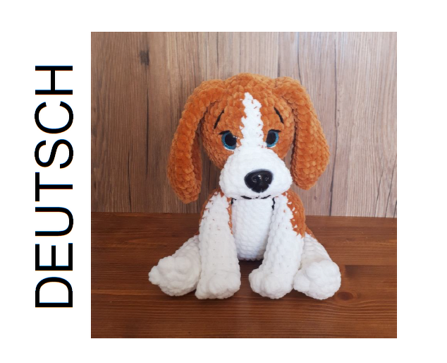 Gehäkelter braun-weißer Amigurumi-Hund mit Schlappohren, sitzend