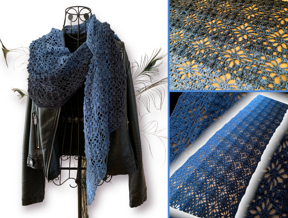 Deep blue crocheted lace scarf with floral motifs draped on a dress form