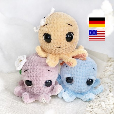 Three plush crocheted amigurumi octopuses in pastel peach, pink with a small white flower, and light blue.