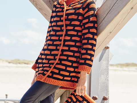 Lange Jacke und Clutch im Hebemaschenmuster in Orange und Schwarz