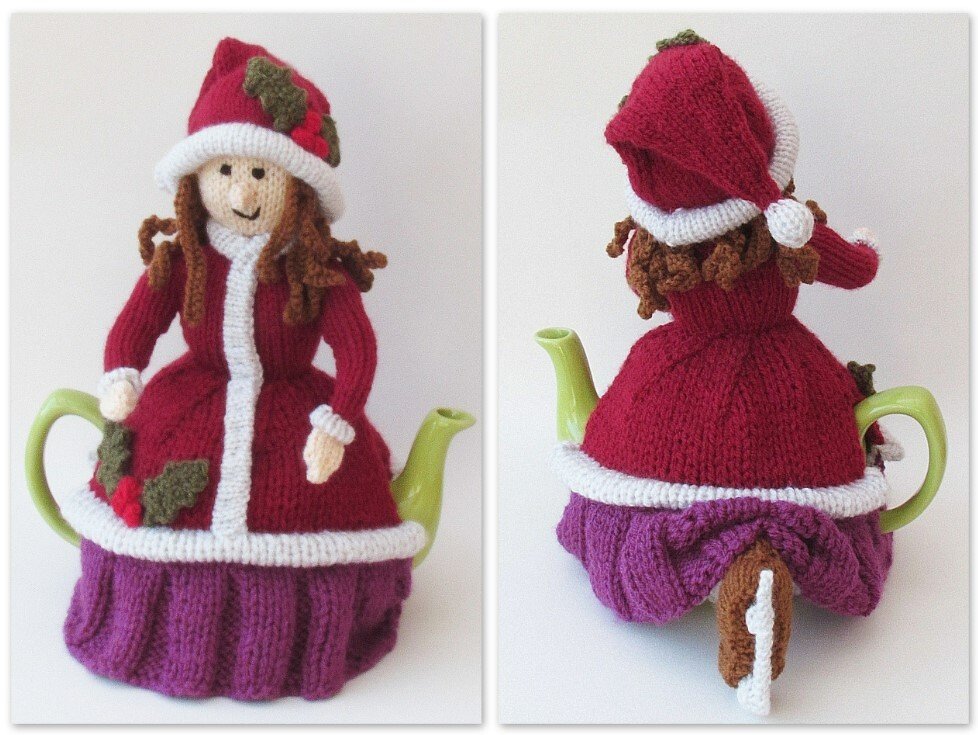 Front and back view of a knitted Santa-style teapot cozy with red coat, white trim, holly leaves, and curly brown yarn hair on a green teapot.