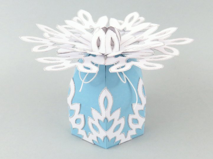 Geschenkverpackung mit Schneeflocke – Bastelanleitung und Vorlagen